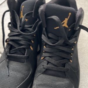 Selling Nike air Jordans high black and gold 1’s size 10.5